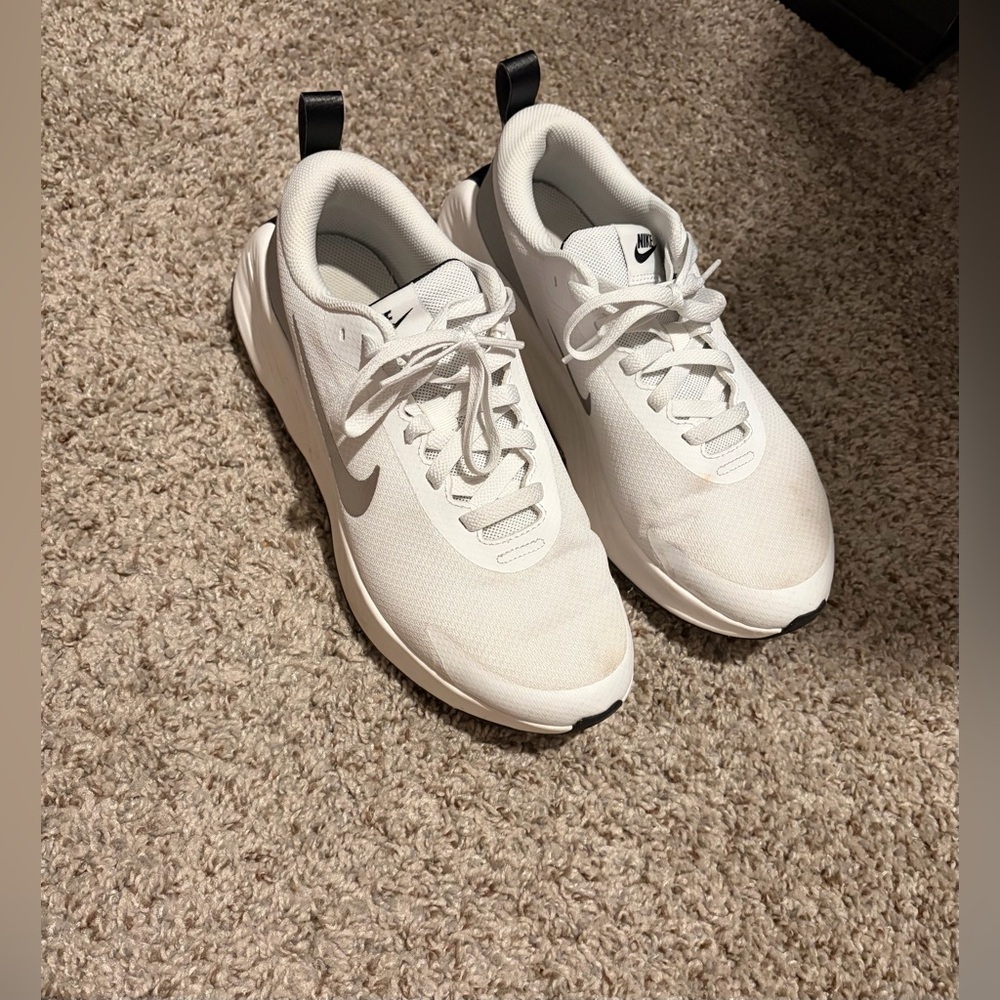 Nike women’s White and Black Sneakers